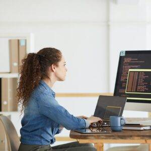 Young Woman Working in Software Development Studio