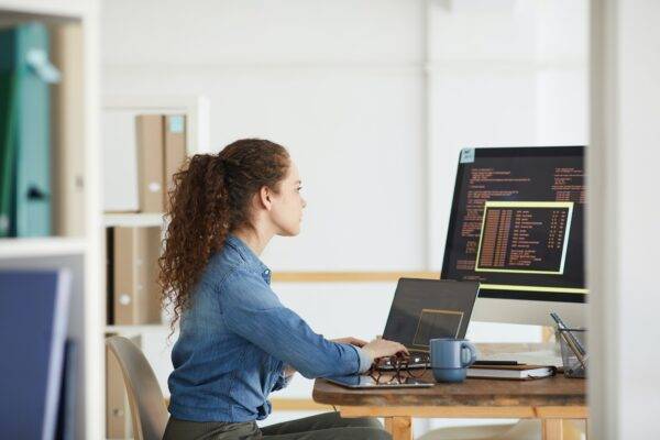 Young Woman Working in Software Development Studio